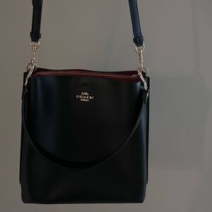 Coach Mollie Bucket Bag - Black. Red interior.